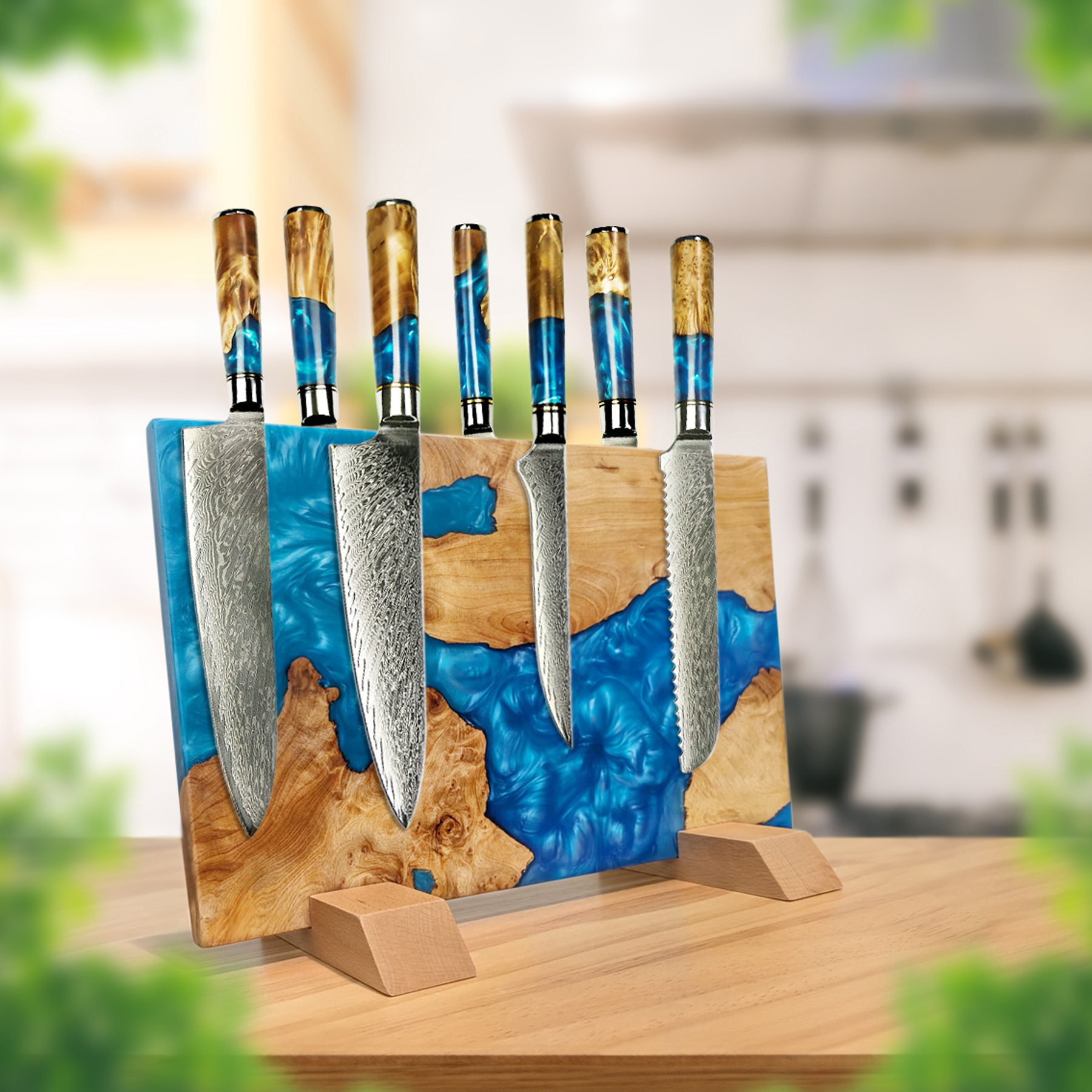 Set of knives with wooden handles in a blue resin holder on a blurred kitchen background