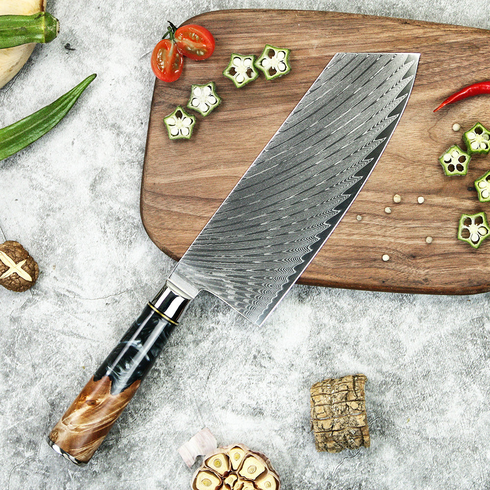 Black cleaver knife on cutting board